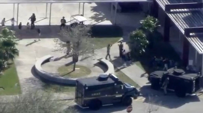 Sheriff: 12 of 17 dead in shooting found inside Florida school; former ...