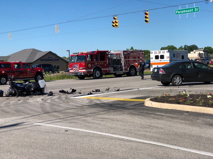 Man dead, woman injured after car fails to yield, hits motorcycle ...