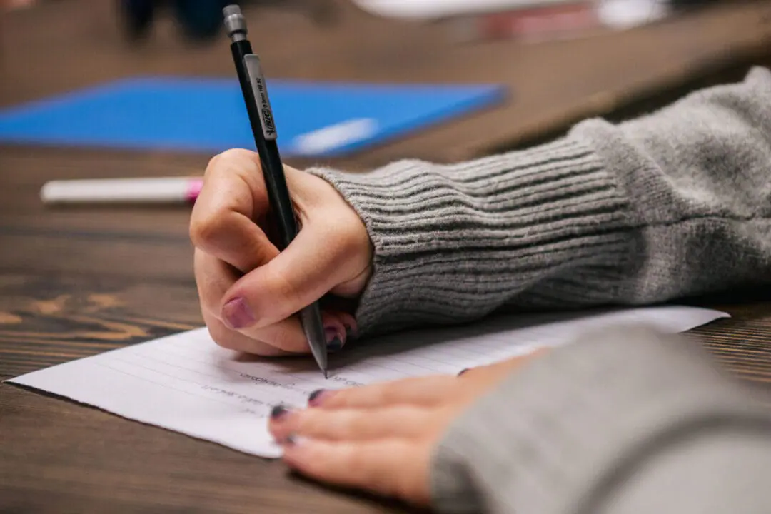 HOUSTON, TEXAS - AUGUST 23: A student takes notes during instruction at the Xavier Academy on August 23, 2021 in Houston, Texas. New ILEARN scores show stagnant progress with Indiana students in grades 3-8, signaling a continued struggle to reverse learning loss.(Provided Photo/Brandon Bell/Getty Images via CNN))