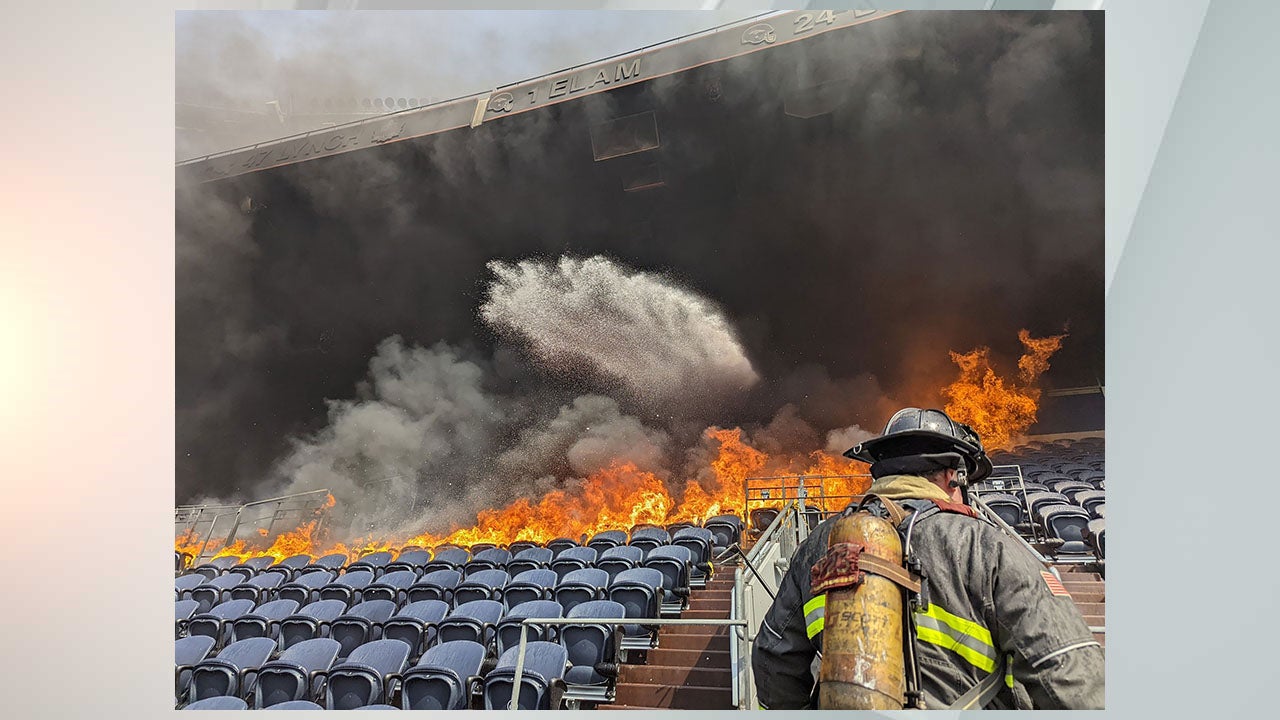 A fire burned through parts of Empower Field at Mile High on