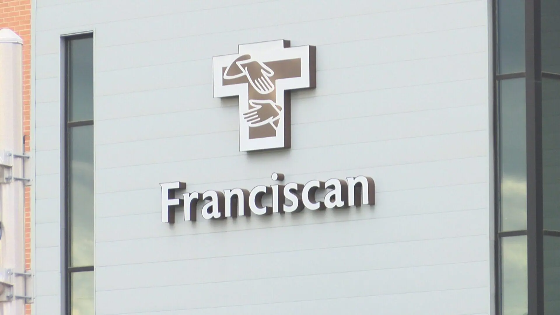 A sign on the side of a Franciscan Health facility in Indianapolis in October 2022. Franciscan Health is offering multiple drive-through flu shot clinics in central Indiana. (WISH Photo)