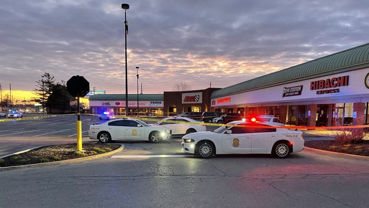 IMPD: Person found shot outside Castleton strip mall