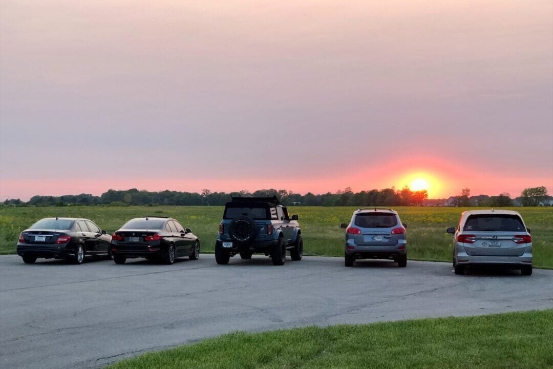 The sun sets in Westfield, Indiana, on May 18, 2023. Sunrises and sunsets have been made more intense by smoke from Canadian wildfires. (WISH Photo/Kyle Fisher)