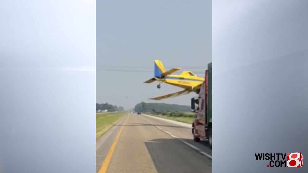 WATCH: Indiana crop dusting plane barely misses semi truck