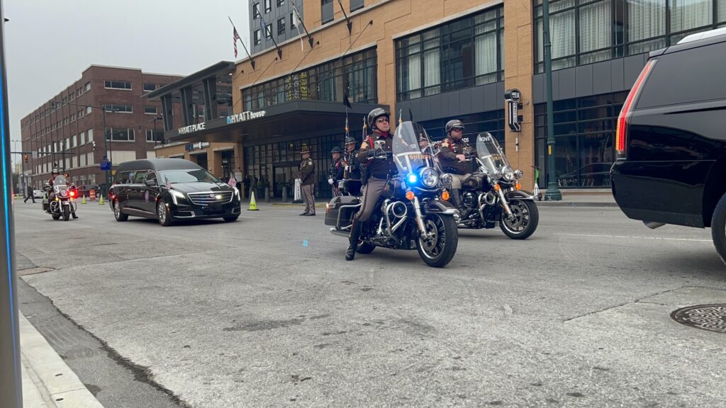 Motorcycles guide the procession taking the body of Marion Co. Sheriff's Deputy John Durm to Gainbridge Fieldhouse in Indianapolis on July 17, 2023. (WISH Photo/Amicia Ramsey)