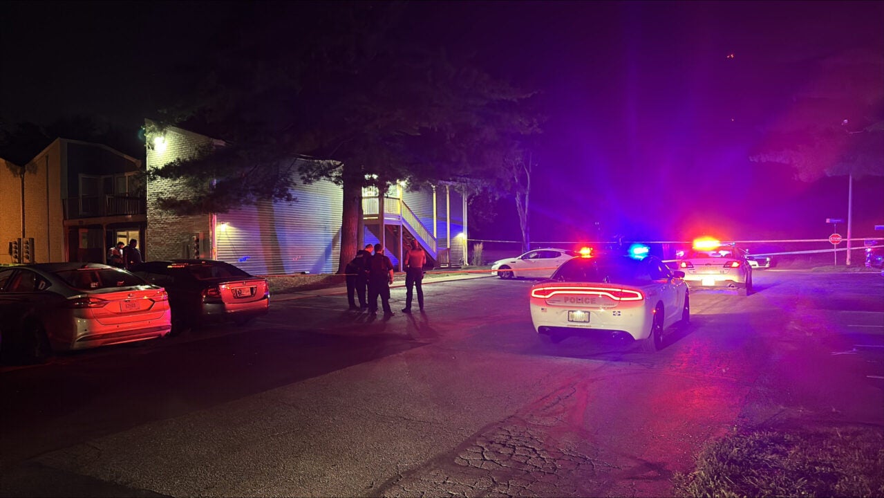 IMPD patrol cars outside a home on Charing Drive in Indianapolis where a person was shot late Friday night, IMPD says. (WISH Photo/Reece Lindquist)