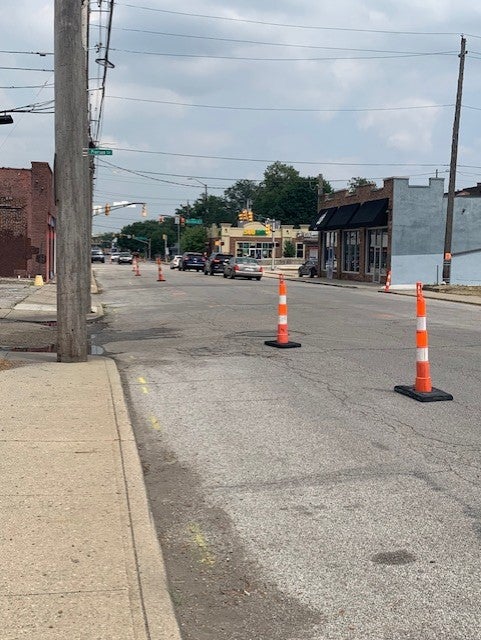 Indy Public Works traffic cones going east. Other side of street.