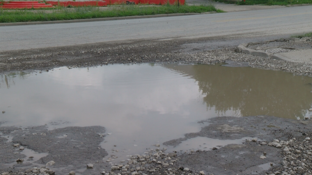 East side pothole continues to deepen, threatening businesses