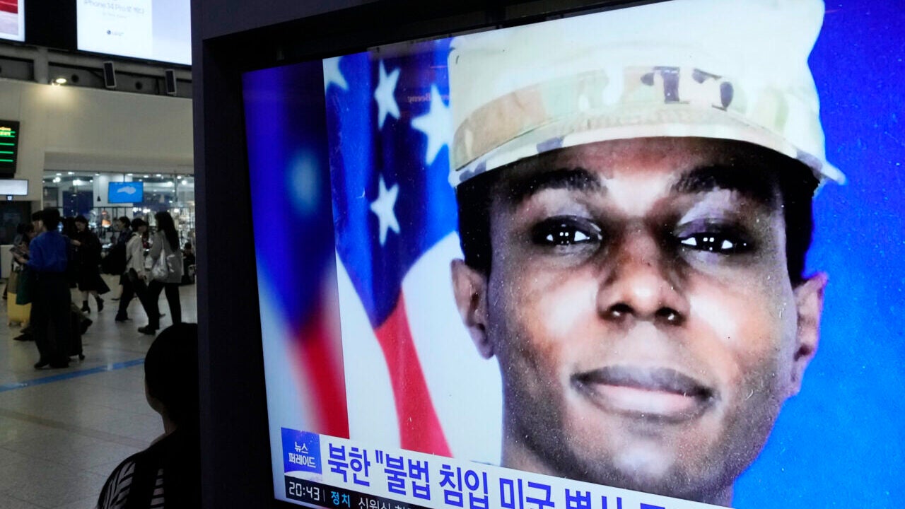 A TV screen shows a file image of American soldier Travis King during a news program at the Seoul Railway Station in Seoul, South Korea, Wednesday, Sept. 27, 2023. North Korea said Wednesday that it will expel King who crossed into the country through the heavily armed border between the Koreas in July. (AP Photo/Ahn Young-joon)