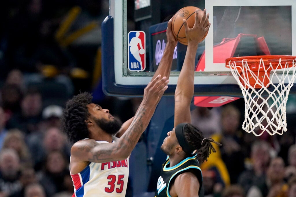 Detroit Pistons' Marvin Bagley III (35) has his shot blocked by Indiana Pacers' Myles Turner (33) during the first half on an NBA in-season tournament basketball game, Friday, Nov. 24, 2023, in Indianapolis. (AP Photo/Darron Cummings)