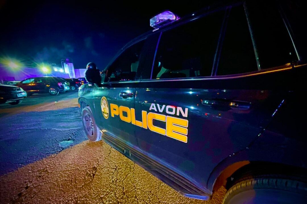 An Avon Police Department vehicle at a warehouse along U.S. 36 in Avon, Indiana. Police arrested one suspect Thursday morning after receiving reports of a man at the warehouse with a gun. (Photo by Avon Police Department/Facebook)