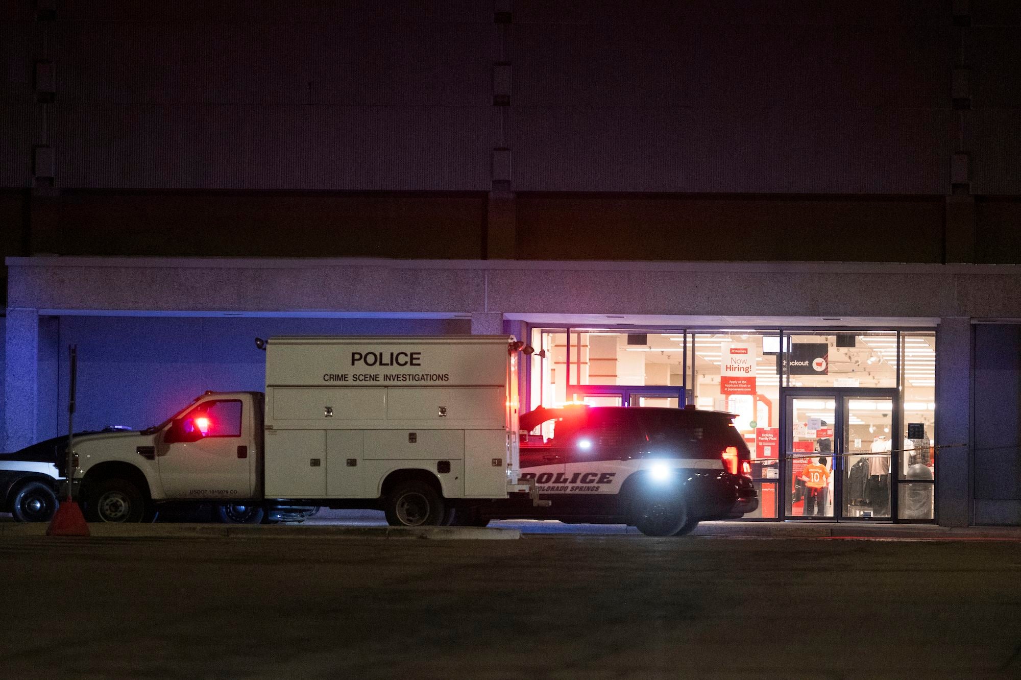 Colorado Springs Police Department investigators continue working the scene at Citadel Mall late Sunday after authorities said a deadly shooting occurred at the shopping center on Christmas Eve.