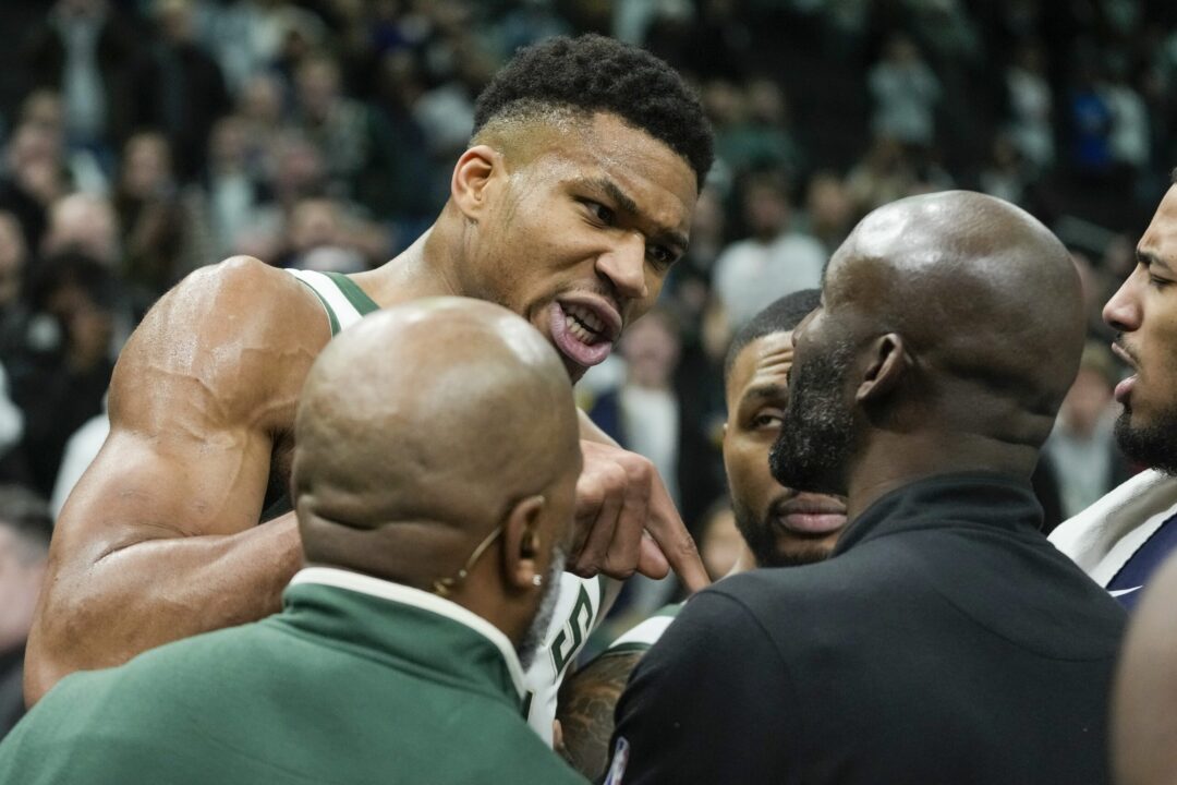 Milwaukee Bucks' Giannis Antetokounmpo argues with a Indiana Pacers coach after an NBA basketball game Wednesday, Dec. 13, 2023, in Milwaukee. (AP Photo/Morry Gash)
