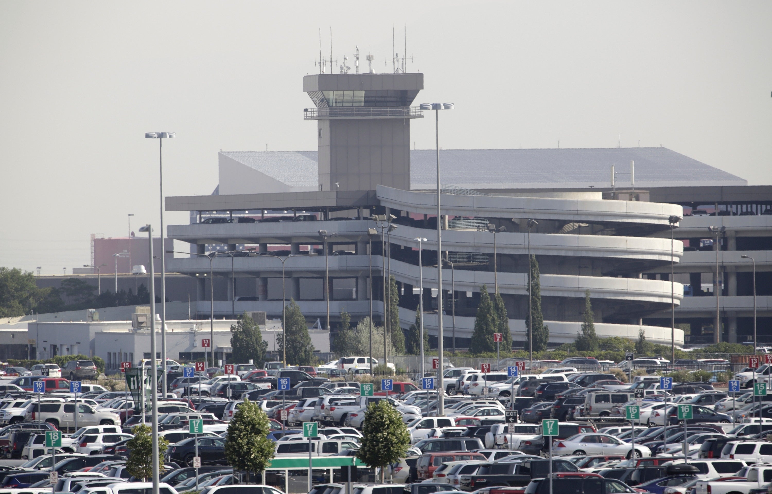 The Salt Lake City International Airport is seen, July 18, 2014, in Salt Lake City. A man was found dead inside an airplane engine on Jan. 1, 2024, at the Salt Lake City International Airport after police say he breached an emergency exit door and walked onto the tarmac. (AP Photo/Rick Bowmer, File)