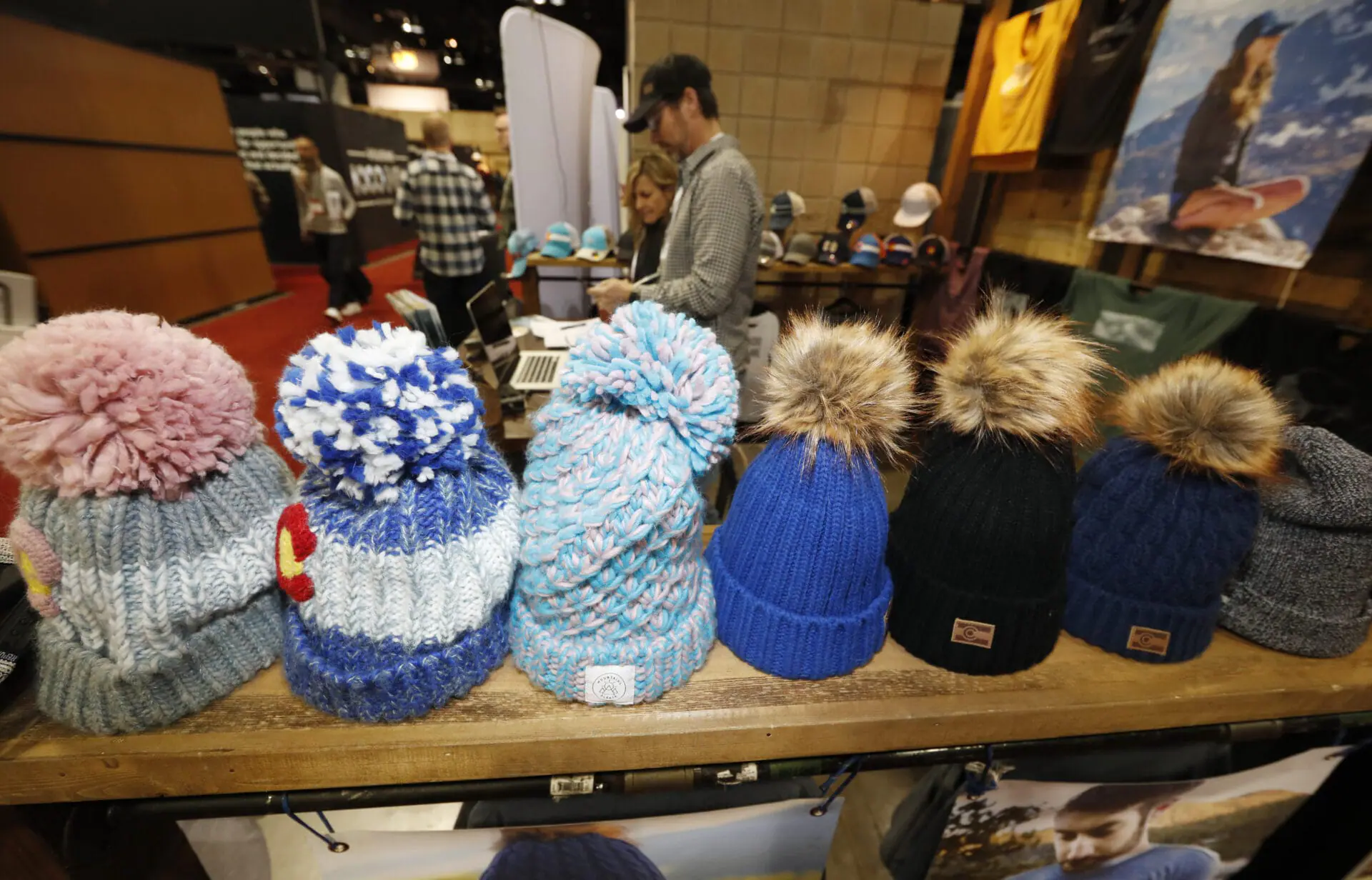 Knit hats stand on display in the Republic exhibit at the Outdoor Retailer & Snow Show Wednesday, Jan. 30, 2019, in the Colorado Convention Center in Denver. Major players in the outdoor industry along with more than 900 other exhibitors are n hand for the show, which will attract more than 25,000 attendees over the weekend. (AP Photo/David Zalubowski)