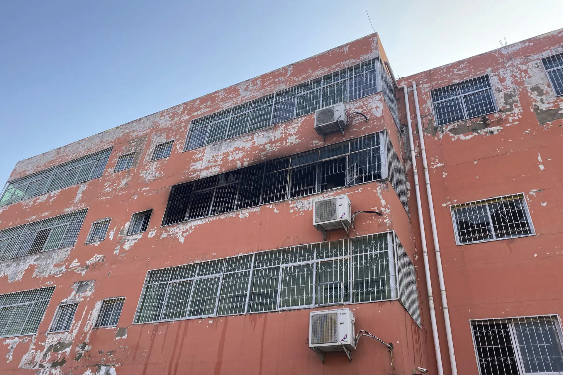 In this photo released by Xinhua News Agency, the dormitory with charred windows is seen after a fire at the Yingcai School in Dushu Town, Fangcheng County, Nanyang city in central China's Henan province on Saturday, Jan. 20, 2024. A fire broke out in dorms at the boarding school for elementary students in central Henan province, and more than a dozen students died in the blaze, Chinese state media reported Saturday.