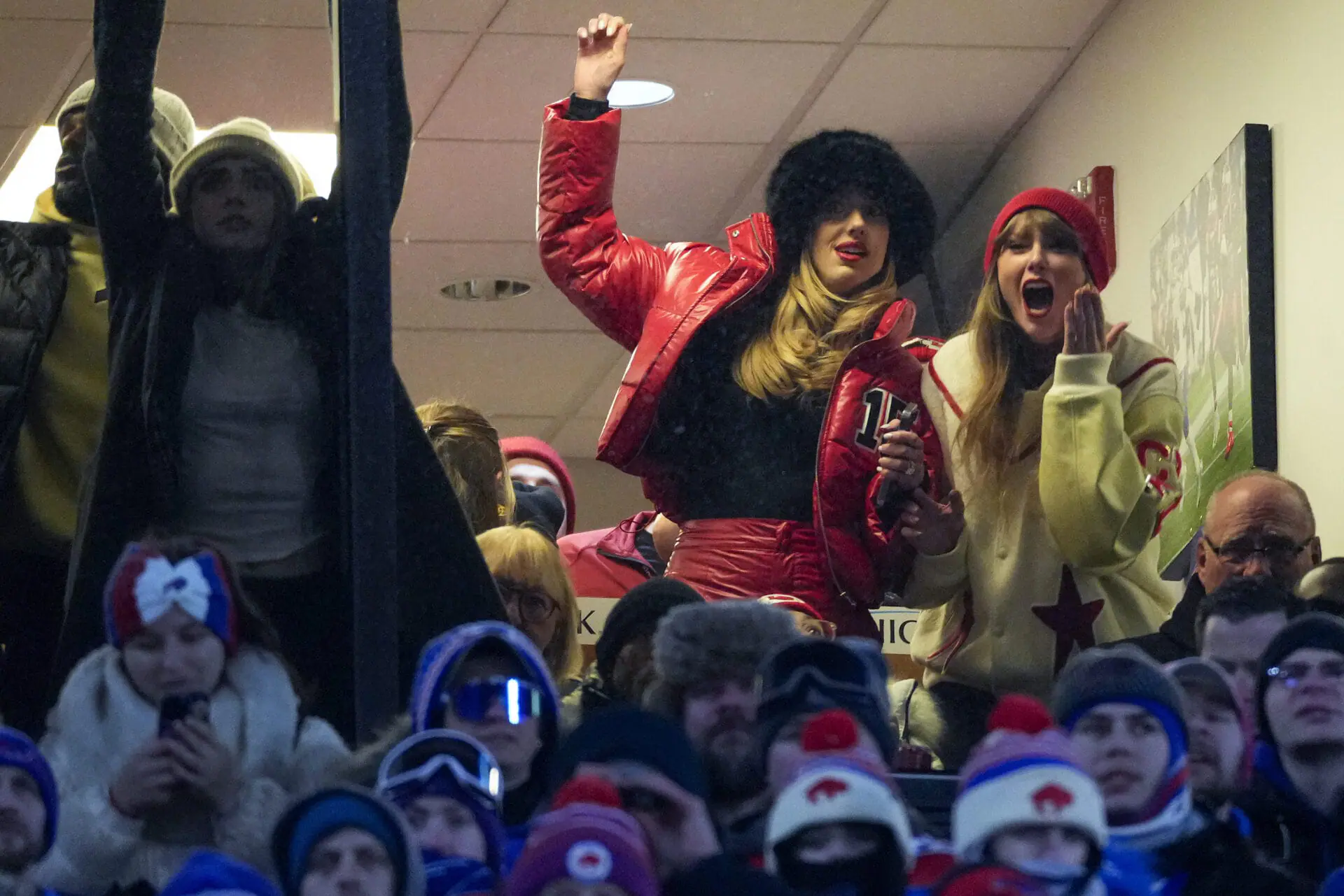 Taylor Swift, right, and Brittany Mahomes react during the third quarter of an NFL AFC division playoff football game between the Buffalo Bills and the Kansas City Chiefs, Sunday, Jan. 21, 2024, in Orchard Park, N.Y.