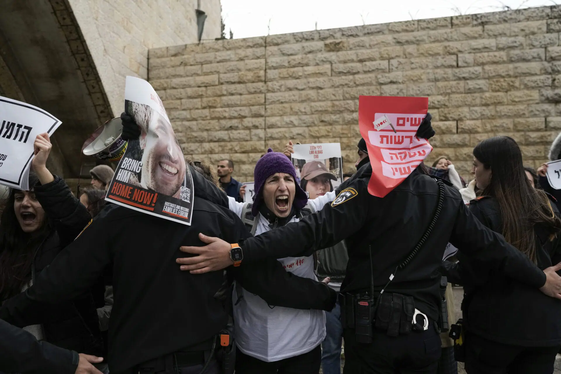 Israeli women demand the immediate release of the Israeli hostages held in the Gaza Strip by the Hamas militant group at a protest in Jerusalem, Wednesday, Jan. 24, 2024. Israel says Hamas is still holding more than 100 people it captured in an Oct. 7 raid that triggered the current war with Israel. (AP Photo/Leo Correa)