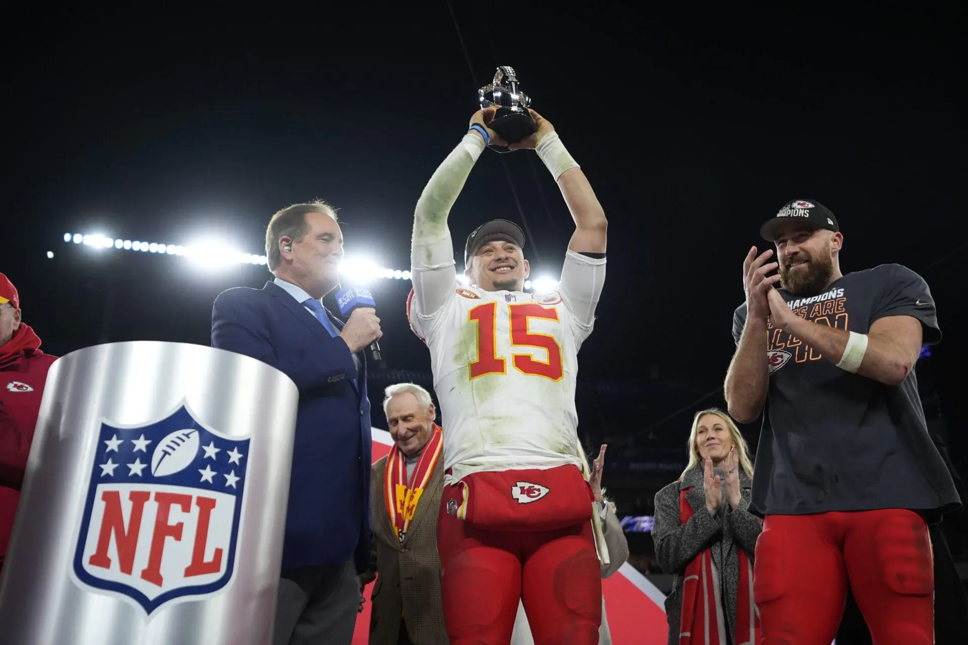 Kansas City Chiefs quarterback Patrick Mahomes (15) holds up the Lamar Hunt Trophy next to Kansas City Chiefs tight end Travis Kelce (87) after the AFC Championship NFL football game against the Baltimore Ravens, Sunday, Jan. 28, 2024, in Baltimore. The Chiefs won 17-10 and will face the San Francisco 49ers in the Super Bowl on Feb. 12. (AP Photo/Matt Slocum)