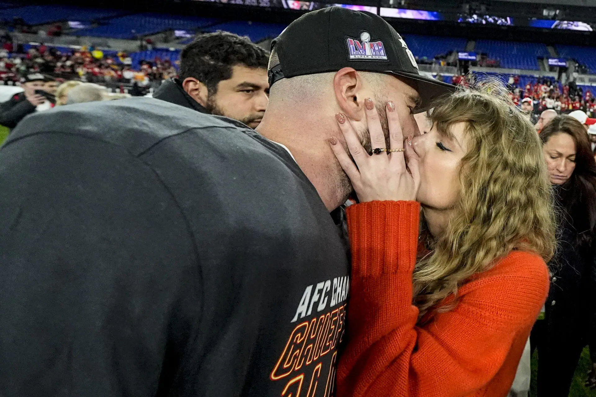 Taylor Swift kisses Kansas City Chiefs tight end Travis Kelce after an AFC Championship NFL football game against the Baltimore Ravens, Sunday, Jan. 28, 2024, in Baltimore. The Kansas City Chiefs won 17-10. Former 