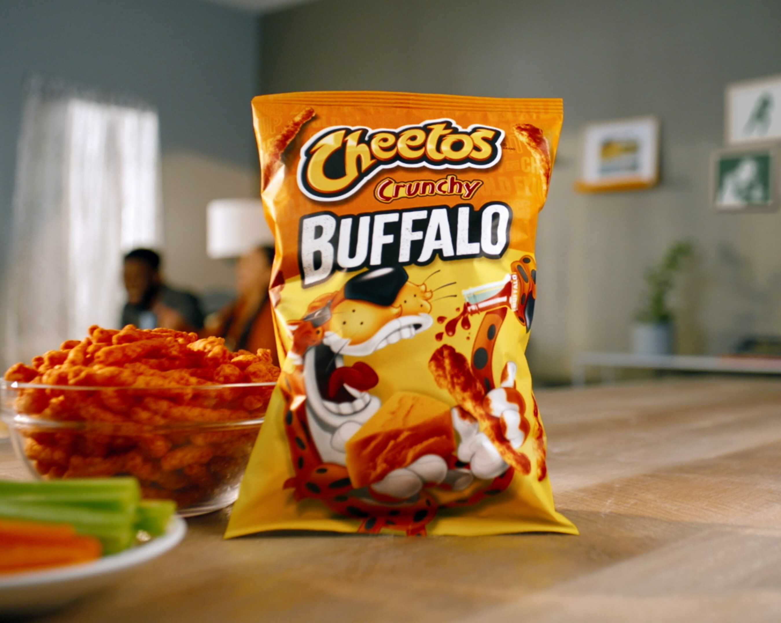 Frito-Lay is taking buffalo chicken dip to a new level with Cheetos Crunchy Buffalo, a permanent addition to the Cheetos lineup. (Photo by Frito-Lay)