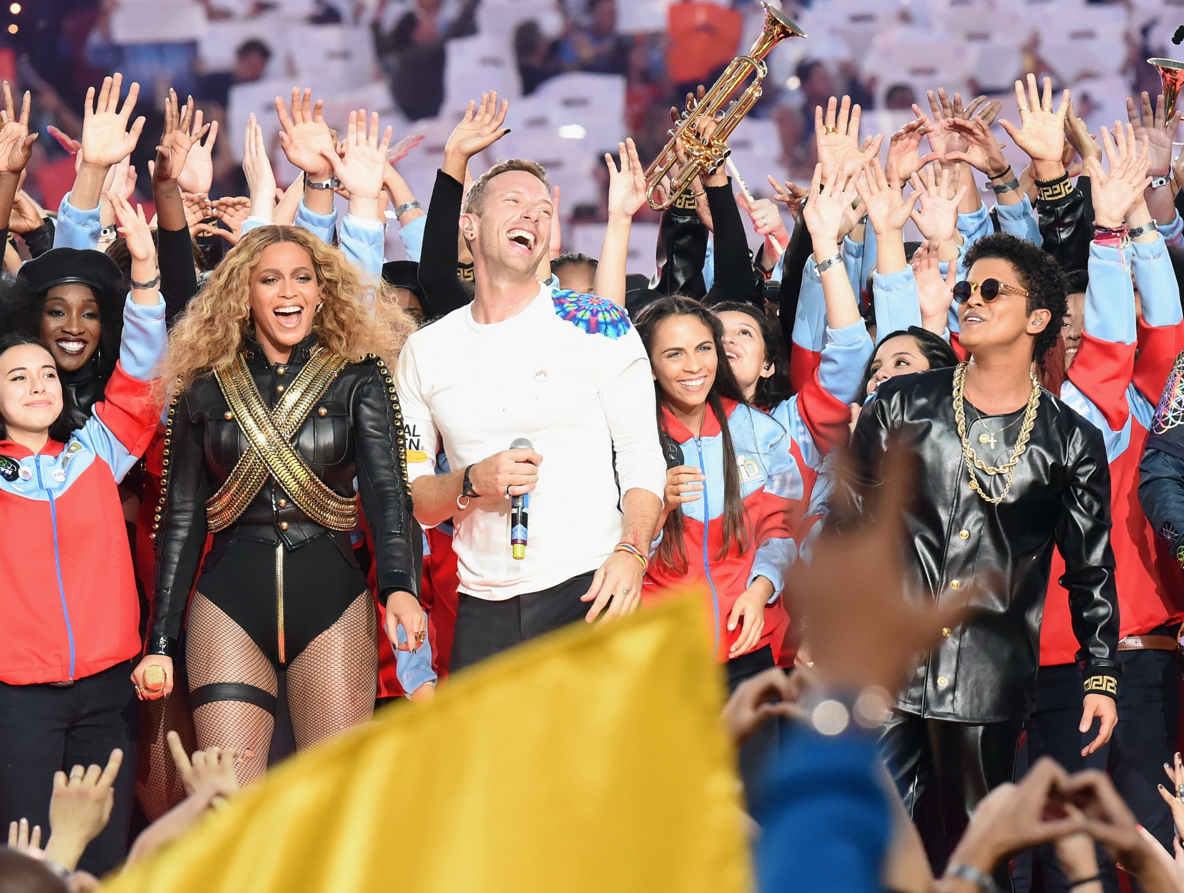 Beyonce, Chris Martin of Coldplay and Bruno Mars perform onstage during the Pepsi Super Bowl 50 Halftime Show at Levi's Stadium on February 7, 2016 in Santa Clara, California. (Photo by Jeff Kravitz/FilmMagic)