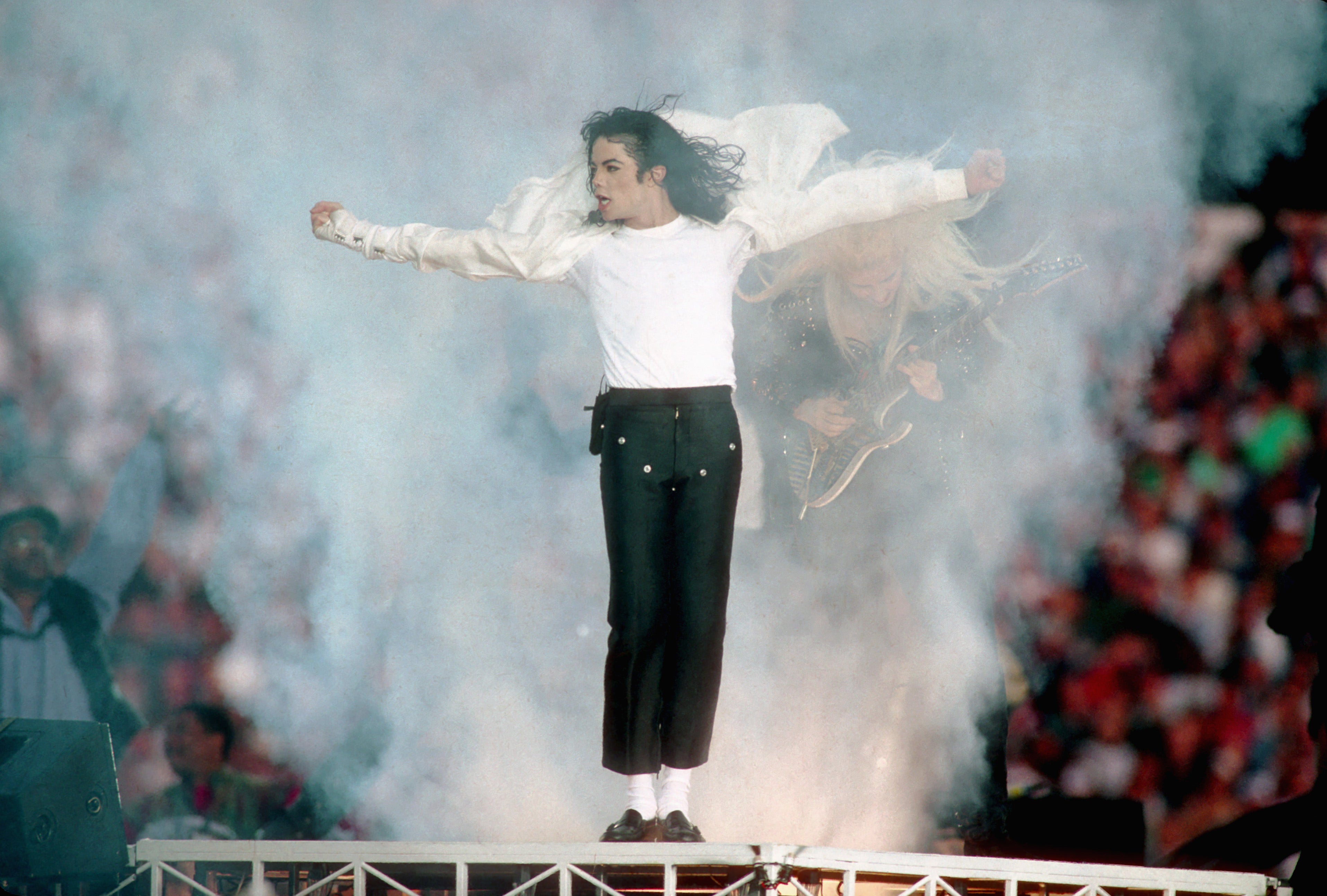 Michael Jackson performs during halftime of a 52-17 Dallas Cowboys win over the Buffalo Bills in Super Bowl XXVII on January 31, 1993 at Rose Bowl in Pasadena California. (Photo by Getty Images)