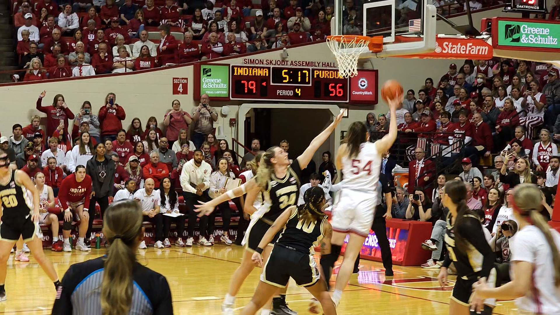Mackenzie Holmes shoots the layup that broke IU's women's basketball point record during an Indiana and Purdue game on Feb. 11, 2024.
