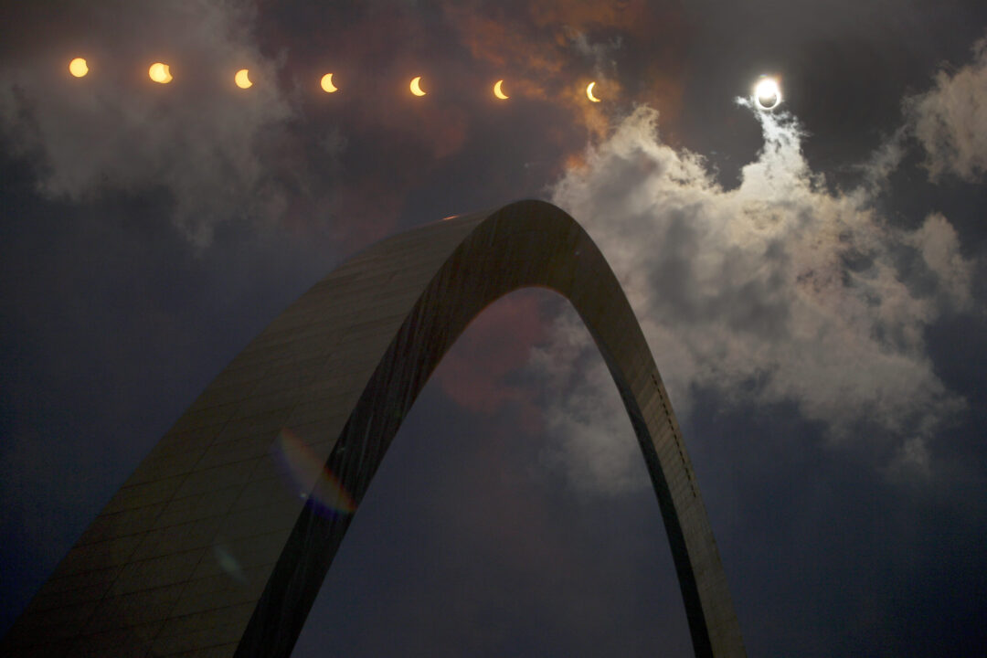 This multiple exposure photograph shows the progression of a partial solar eclipse over the Gateway Arch in St. Louis on Aug. 21, 2017. (AP Photo/Jeff Roberson, File)