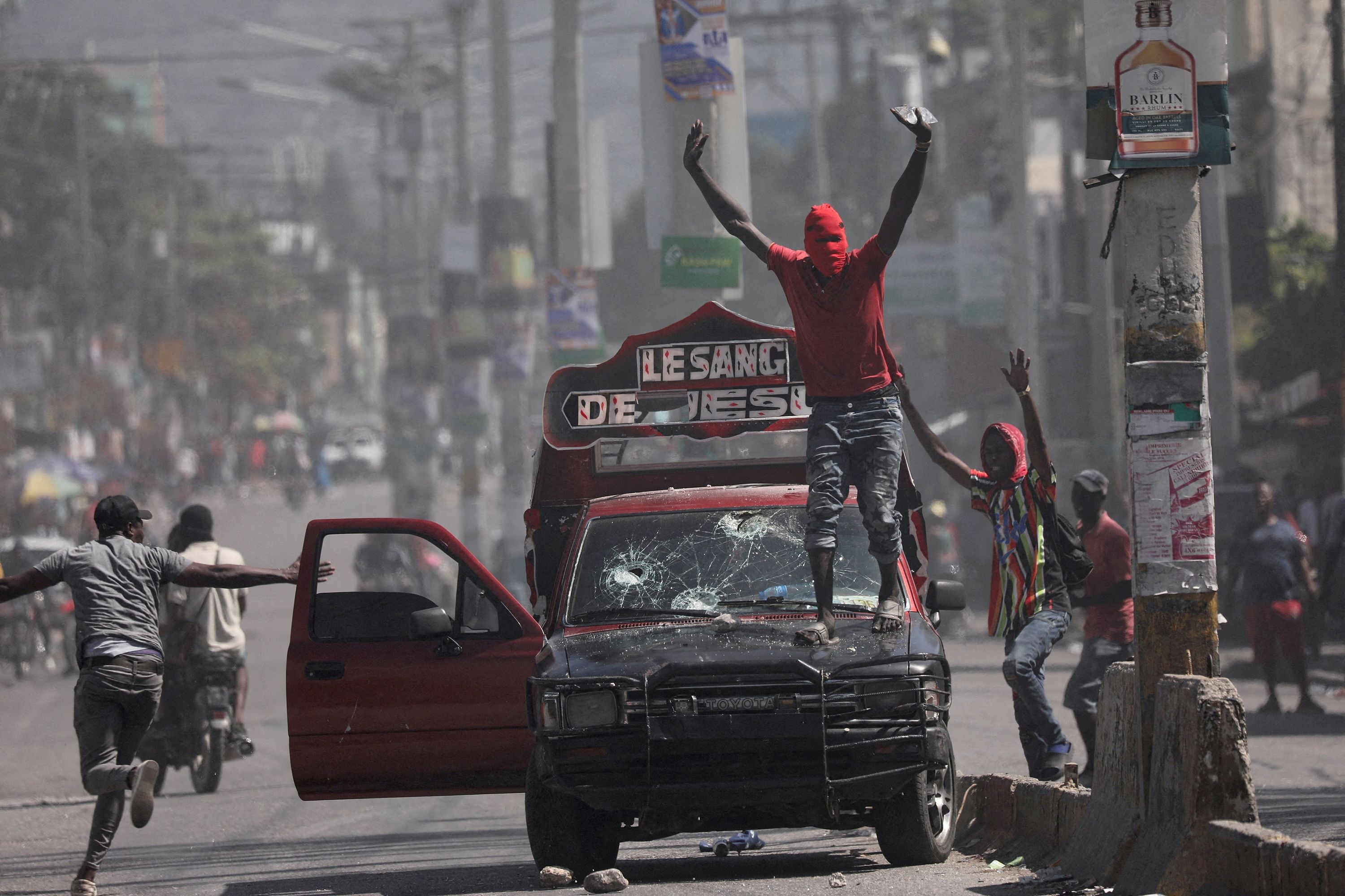 Protesters in Port-au-Prince, Haiti, on March 1, 2024. Haiti’s government declared a state of emergency on Sunday after thousands of inmates apparently escaped from its largest prison during a surge of gang violence. (Photo by Ralph Tedy Erol/Reuters via CNN Newsource)