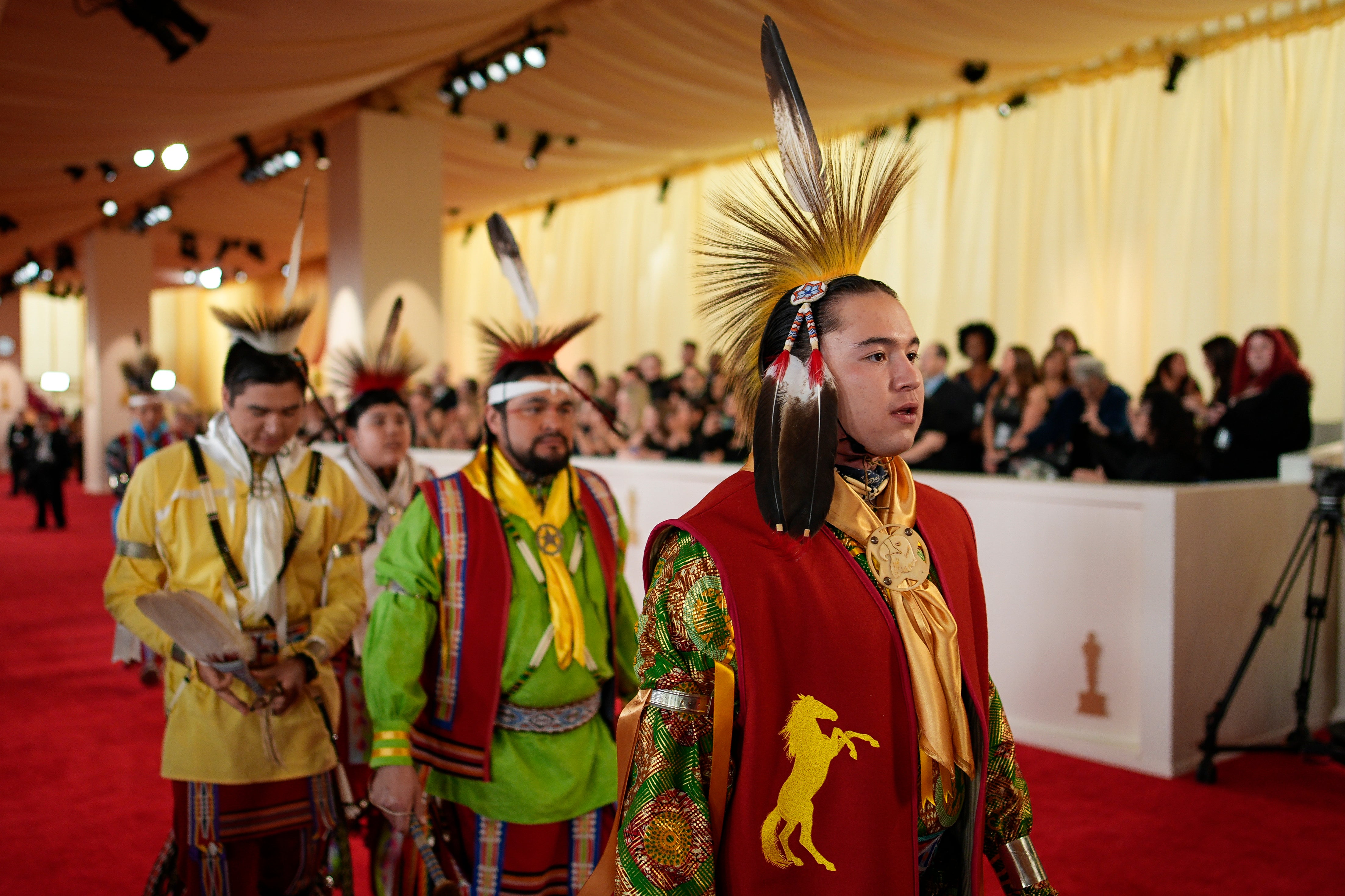 Members of the Osage Nation arrive at the Oscars on Sunday, March 10, 2024, at the Dolby Theatre in Los Angeles. (AP Photo/John Locher)