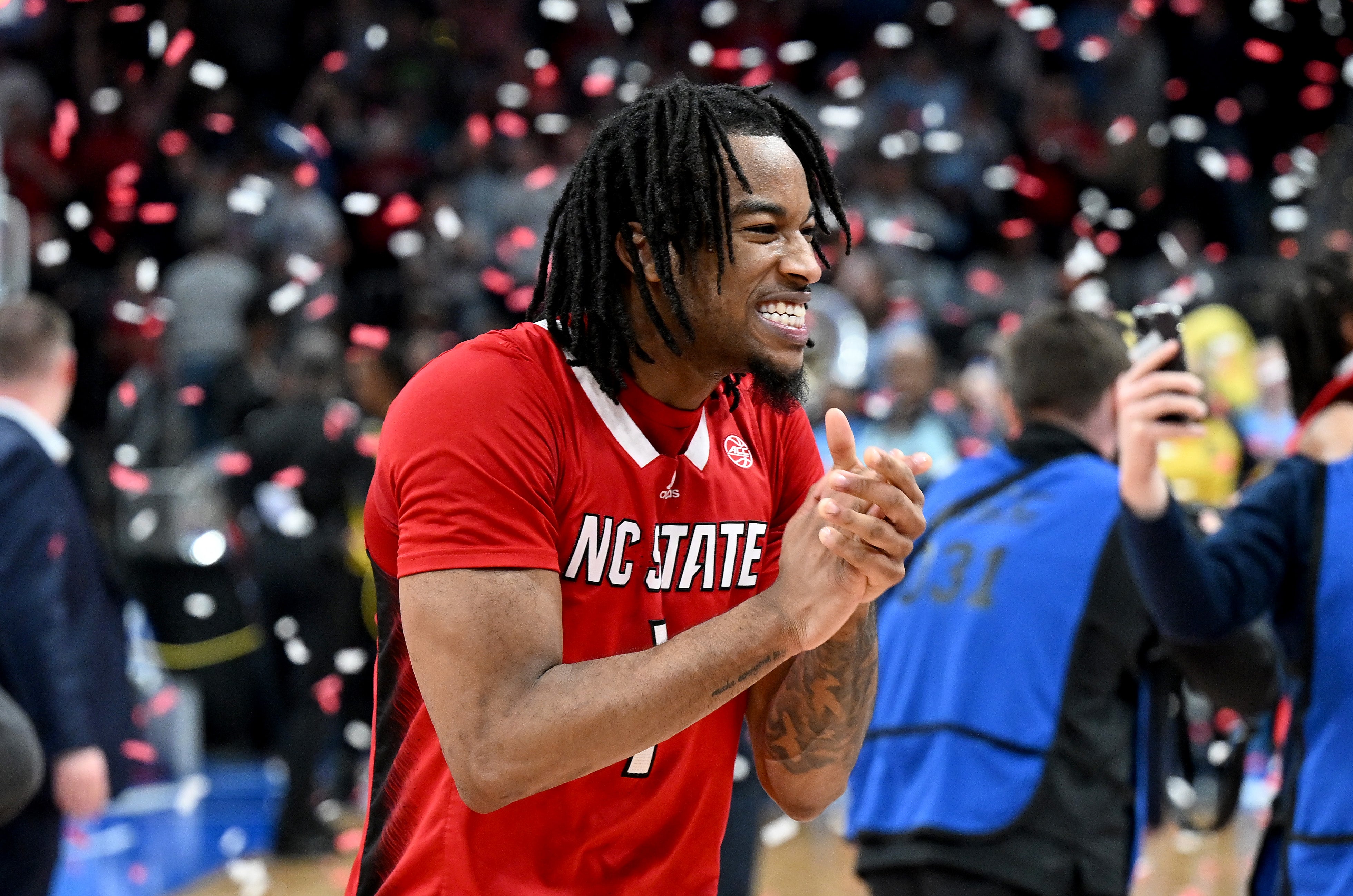 WASHINGTON, DC - MARCH 16: Jayden Taylor #1of the North Carolina State Wolfpack celebrates after a victory against the North Carolina Tar Heels in the Championship Game of the ACC Men's Basketball Tournament at Capital One Arena on March 16, 2024 in Washington, DC.