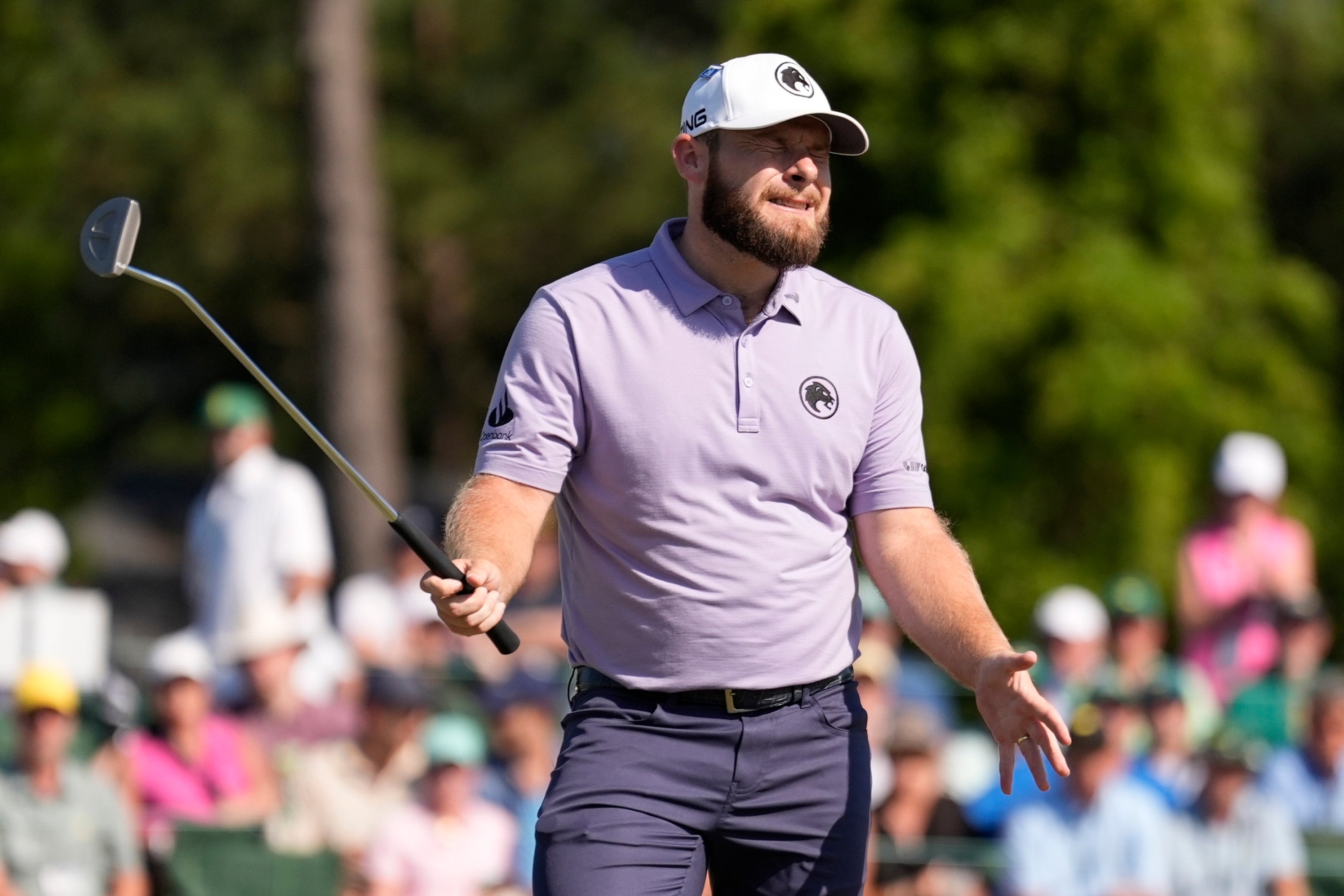 Tyrrell Hatton, of England, reacts after missing a putt on the 18th hole during final round at the Masters golf tournament at Augusta National Golf Club Sunday, April 14, 2024, in Augusta, Ga. (AP Photo/Ashley Landis)