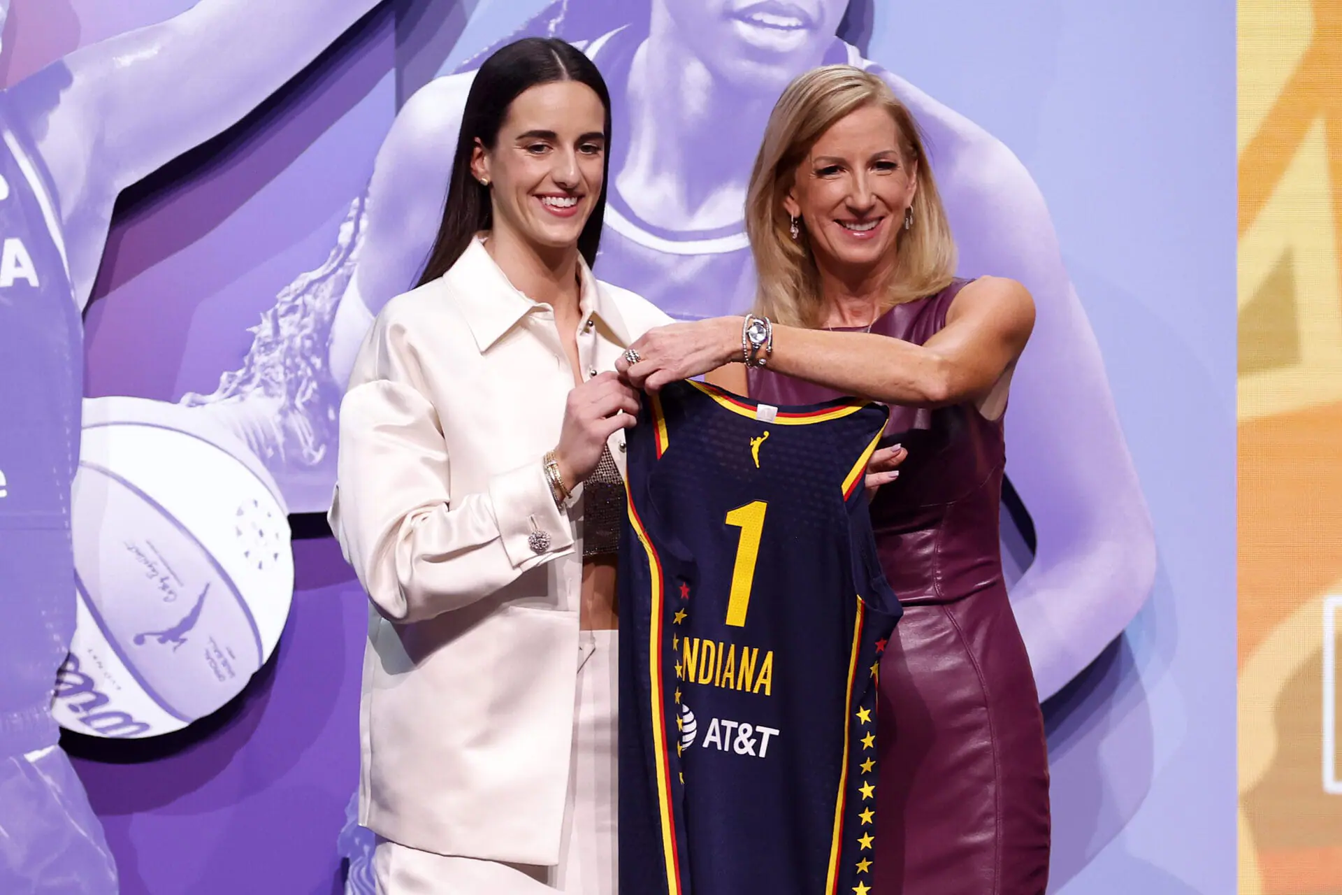 Caitlin Clark poses with WNBA Commissioner Cathy Engelbert after being selected first overall pick by the Indiana Fever during the 2024 WNBA Draft at Brooklyn Academy of Music on April 15, 2024 in New York City. (Photo by Sarah Stier/Getty Images)