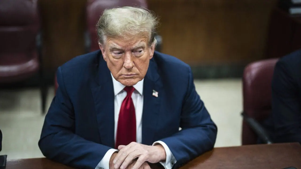 FILE - Former President Donald Trump is pictured in a Manhattan criminal court ahead of the start of jury selection in New York on April 15, 2024. The former president's social media company is in a deep slump after shares of the tech group dropped to their lowest level since a merger in the spring of 2024.