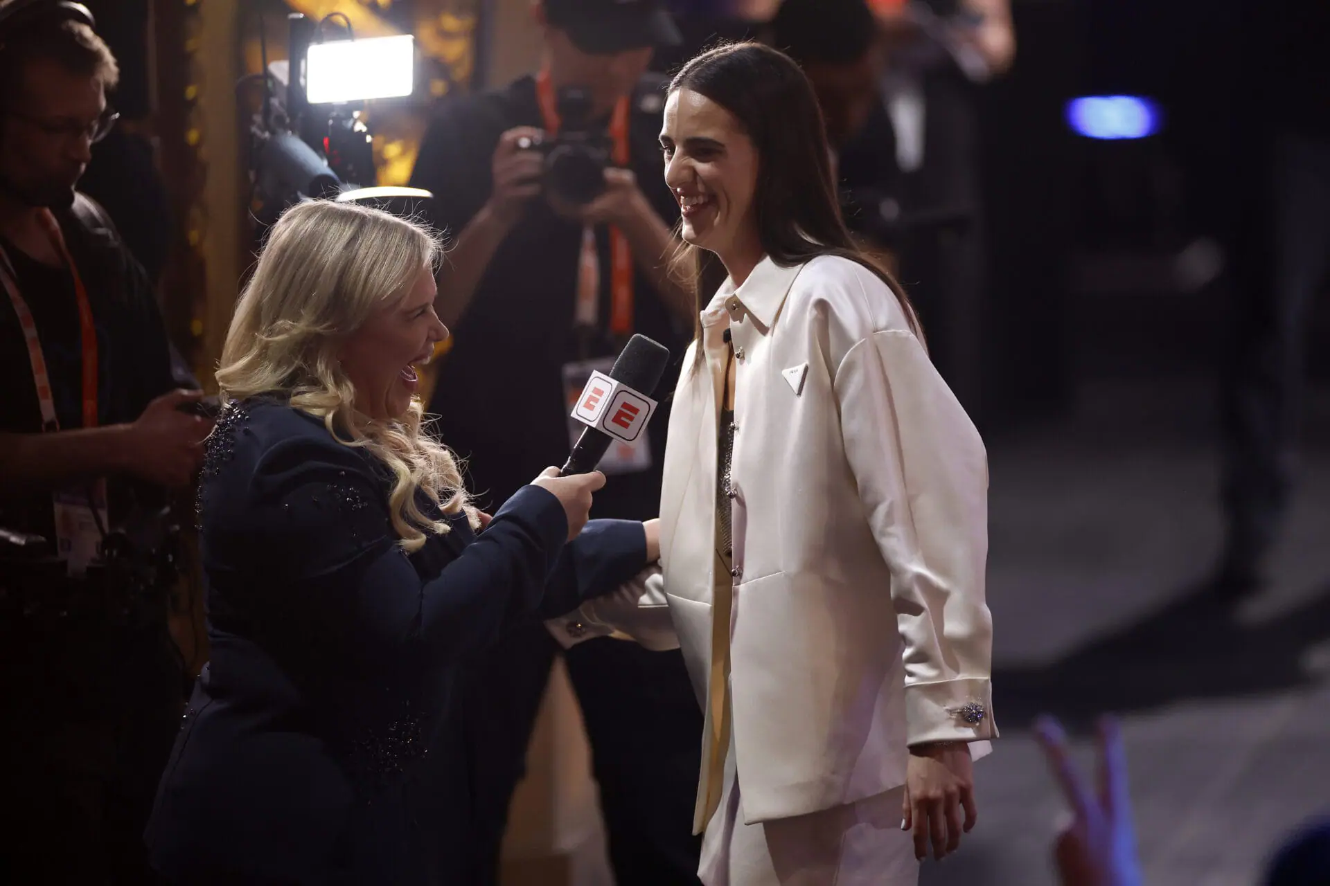 Caitlin Clark celebrates after being selected first overall pick by the Indiana Fever during the 2024 WNBA Draft at Brooklyn Academy of Music on April 15, 2024 in New York City. (Photo by Sarah Stier/Getty Images)