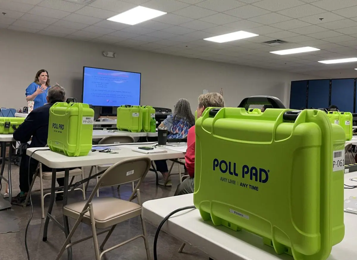 Poll workers watch Shannon Samson present at training April 17 at the Marion County Election Board Service Center. (Photo by Sophie Young/Mirror Indy)