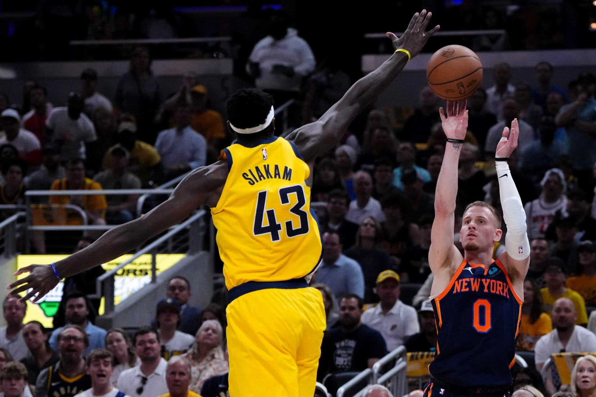 Donte DiVincenzo #0 of the New York Knicks shoots the ball against Pascal Siakam #43 of the Indiana Pacers during the first quarter in Game Four of the Eastern Conference Second Round Playoffs at Gainbridge Fieldhouse on May 12, 2024 in Indianapolis, Indiana.