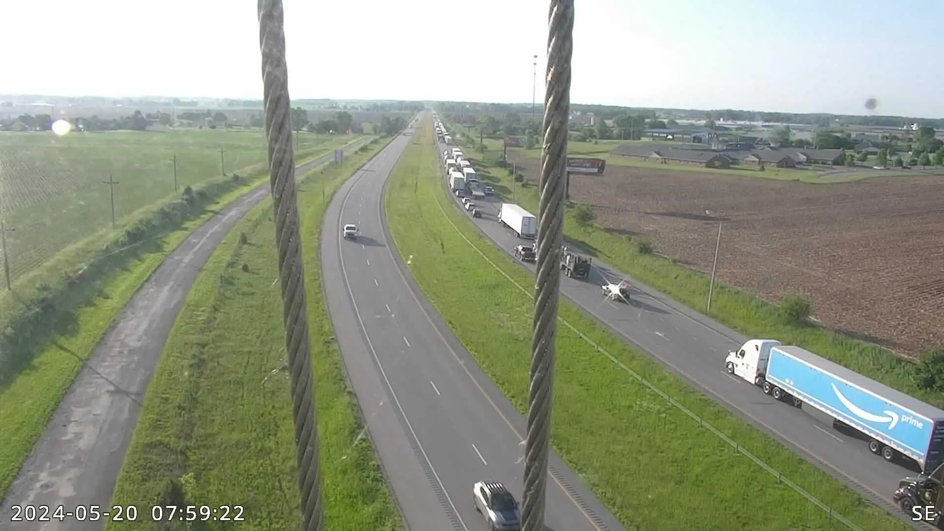 A semi hauling potatoes caught fire Monday morning on I-74 in Decatur County, causing significant backups and delays. (INDOT Photo)