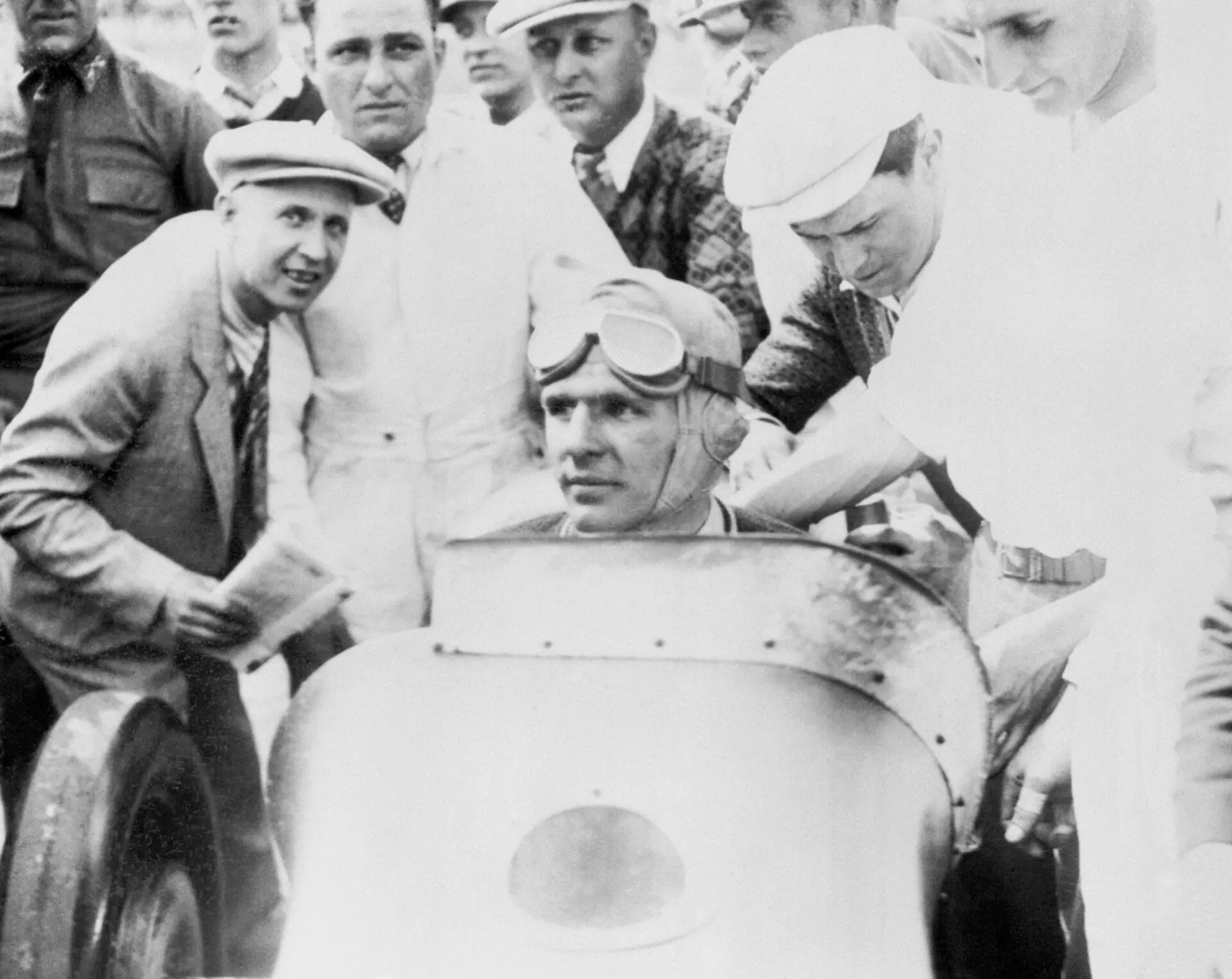 Photo shows Louis Meyer, 23 year old Californian as he appeared in his Miller Special after winning the 16th annual 500 mile auto race at the Indianapolis Speedway. Meyer averaged speed of 99 miles an hour to win. (Photo by Bettmann/Getty Images)