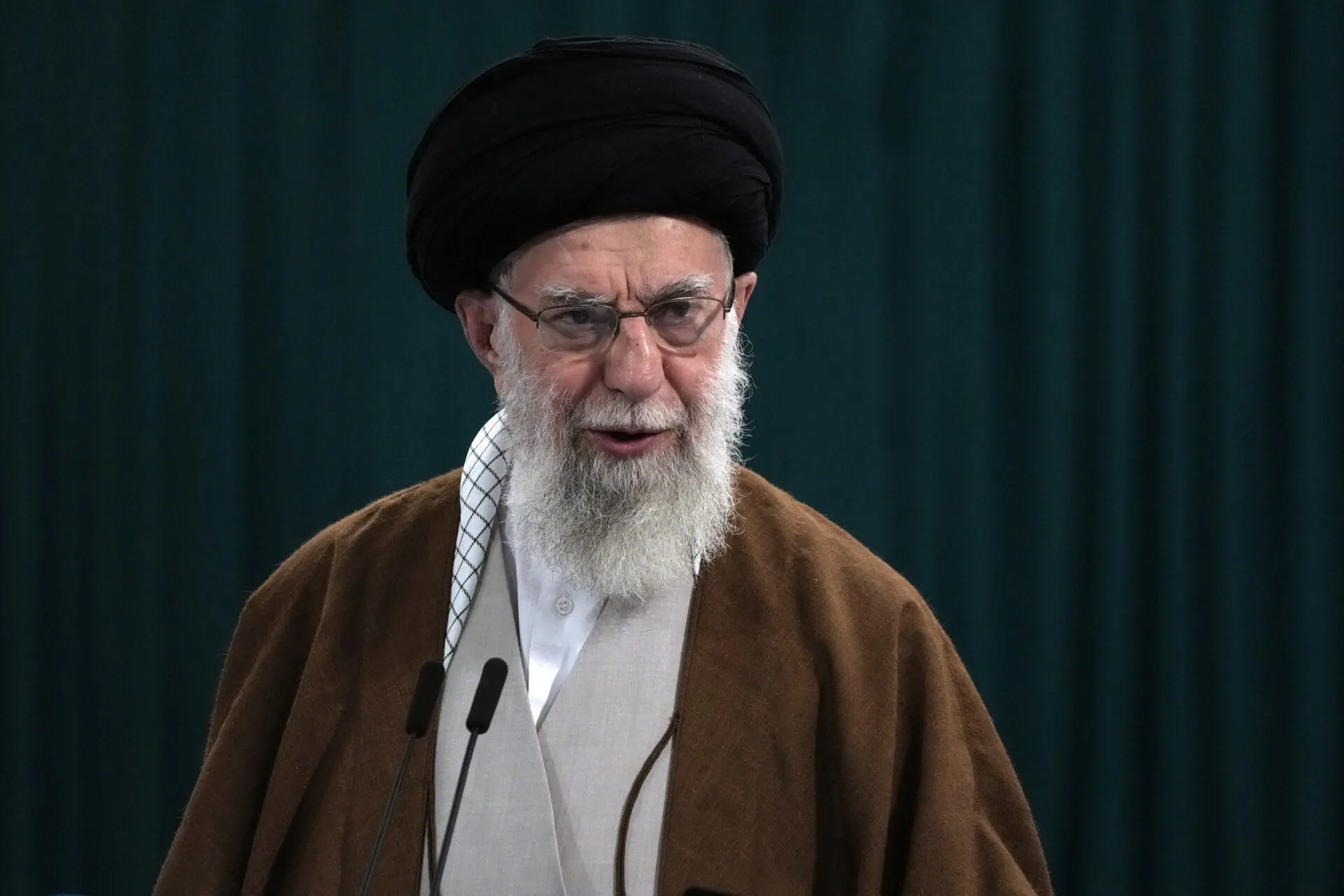 Iranian Supreme Leader Ayatollah Ali Khamenei speaks with media members after he voted for the parliamentary runoff elections, in Tehran, Iran, Friday, May 10, 2024. (AP Photo/Vahid Salemi, File)