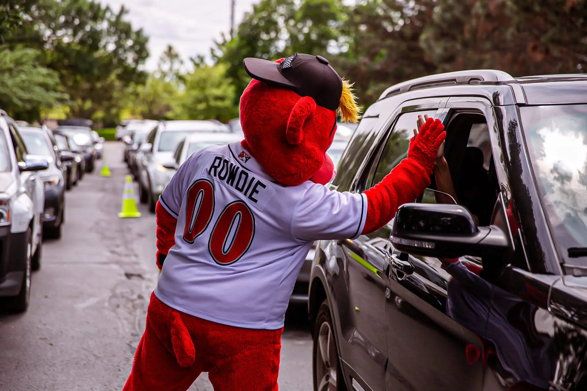 In partnership with Gleaners Food Bank of Indiana and the Indiana Women, Infants, and Children nutrition program, the Indianapolis Indians on May 23, 2024, host a food drive-thru distribution event for up to 500 households at Victory Field in Indianapolis. (Provided Photo/Cheyne Reiter of Indianapolis Indians)