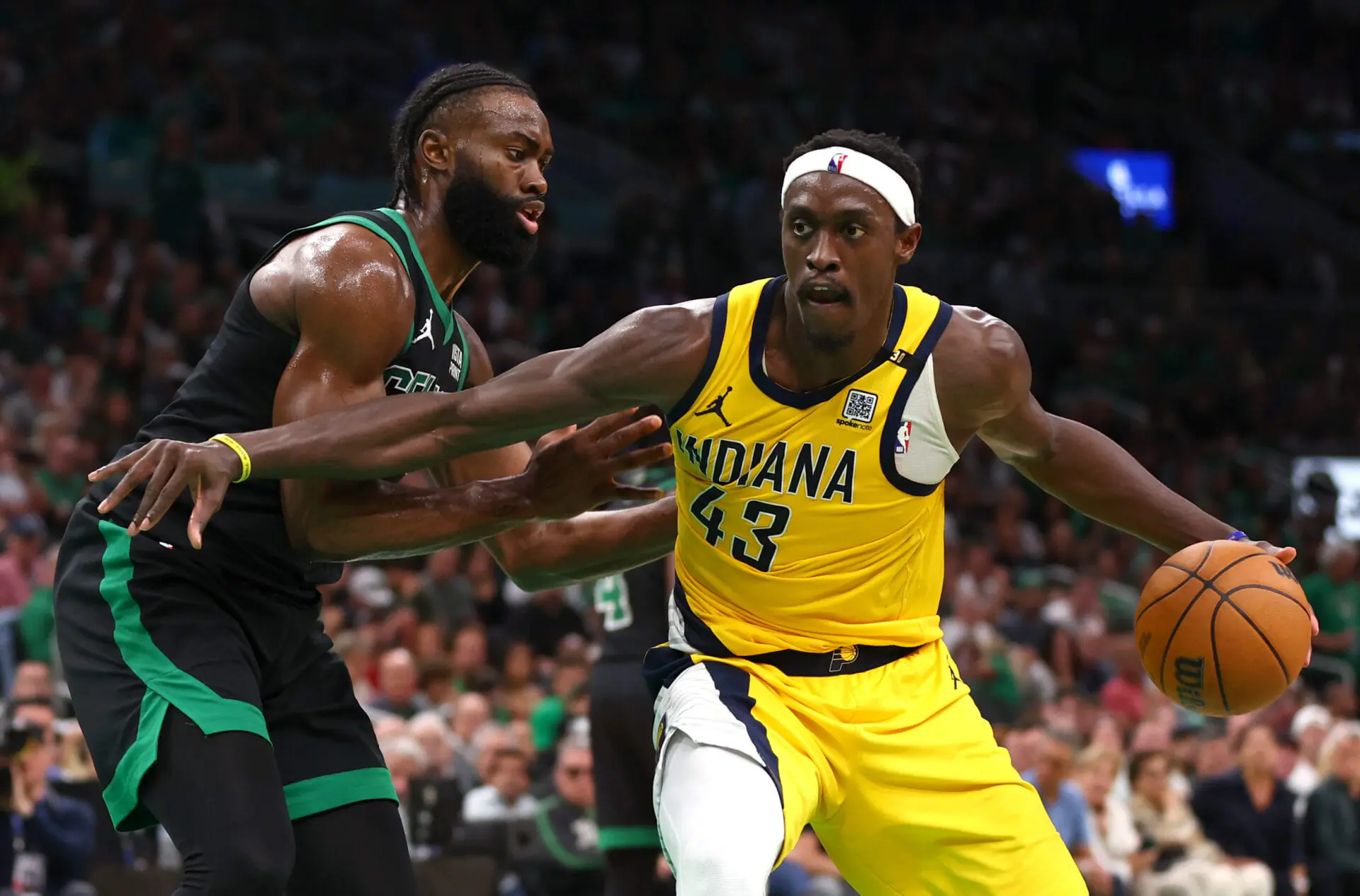 Pascal Siakam #43 of the Indiana Pacers drives past Jaylen Brown #7 of the Boston Celtics