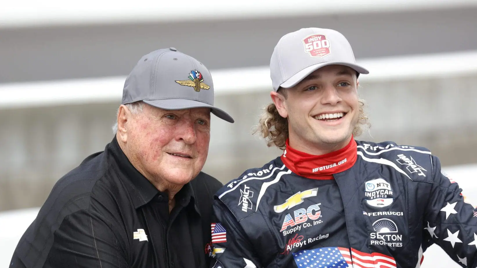 INDIANAPOLIS, IN - MAY 18: Team owner A.J. Foyt poses for a photo with driver Santino Ferrucci on May 18, 2024, during qualifications for the 108th running of the Indianapolis 500 at the Indianapolis Motor Speedway in Indianapolis, Indiana. (Photo by Brian Spurlock/Icon Sportswire via Getty Images)