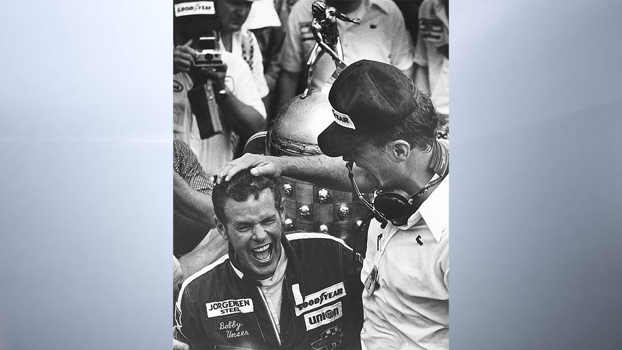 Bobby Unser won his second of three Indianapolis 500s in 1975, and is shown here with car owner Dan Gurney (R). He had started in the third spot from the front row in the Jorgensen Eagle/Offy. (Photo by ISC Archives/CQ-Roll Call Group via Getty Images)