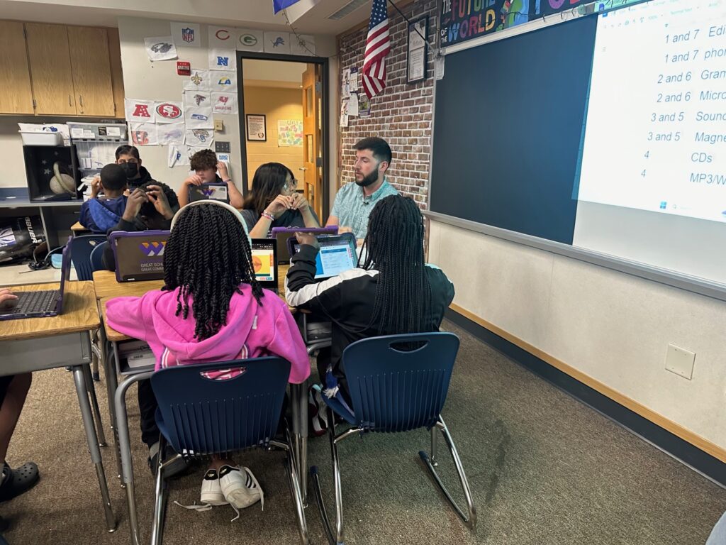 May's Golden Apple Award winner is Mr. David Edison, a science teacher in Wayne Township. Here, Edison is seen teaching in his classroom after receiving the award. (WISH Photos)