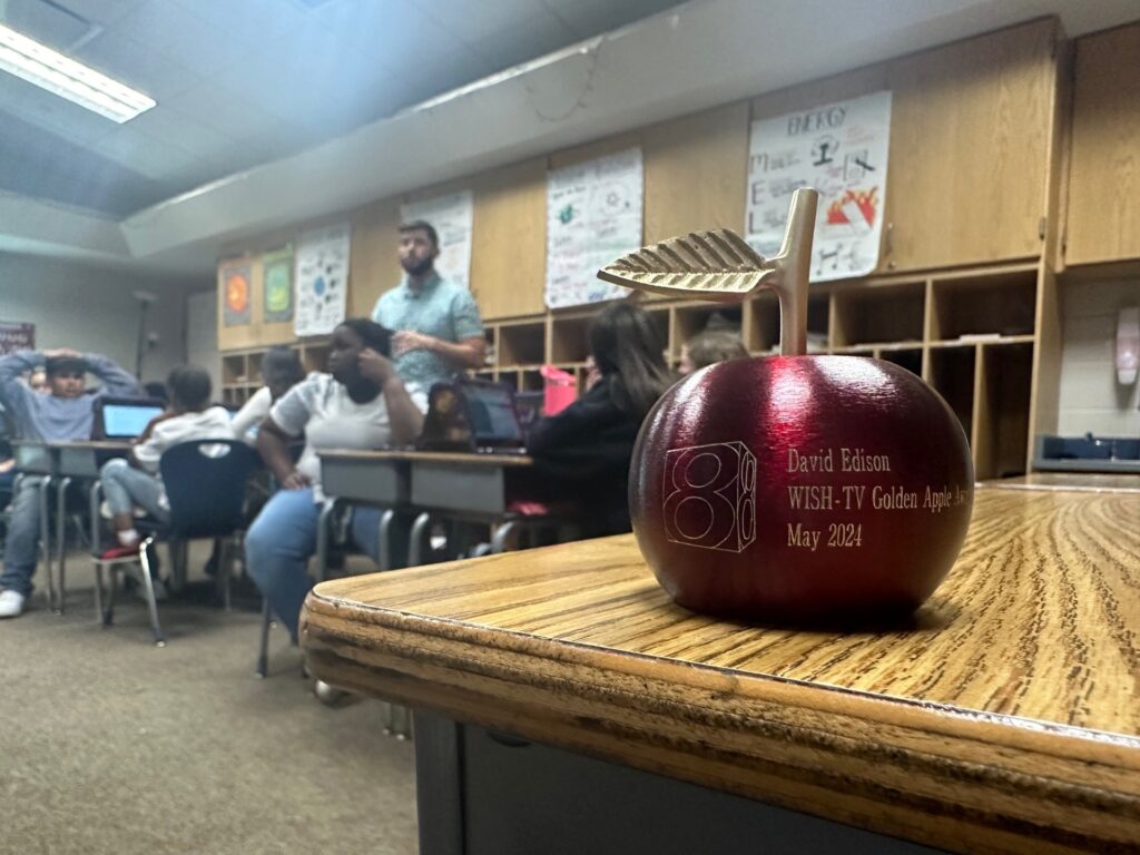 May's Golden Apple Award winner is Mr. David Edison, a science teacher in Wayne Township. Here, Edison is seen teaching in his classroom after receiving the award.  (WISH Photos)