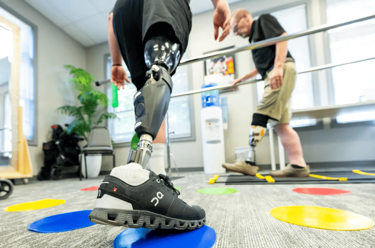 People with amputations participated in a workout class May 23, 2024, at Kenney Orthopedics in Carmel. Some participants are learning to use a prosthetic for the first time, while others are getting comfortable with newer devices.