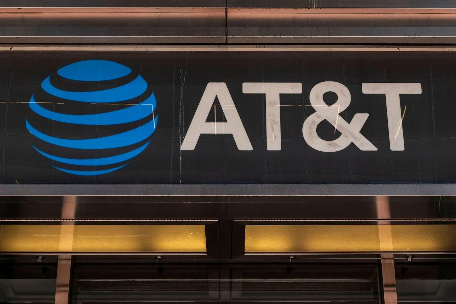 AT&T logo. (Nicolas Economou/NURPHO/AP/File via CNN Newsource)