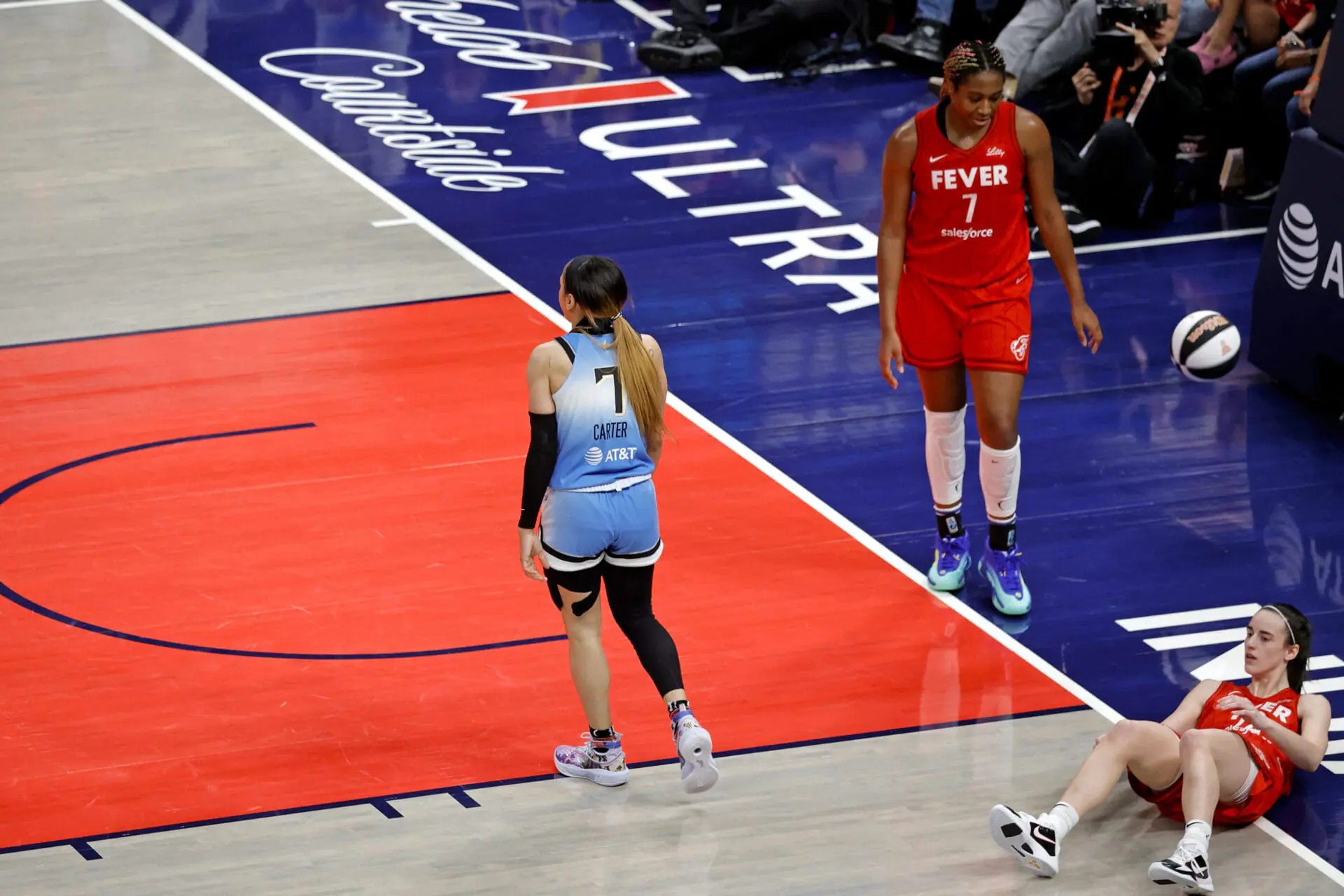 Chicago Sky guard Chennedy Carter (7) is whistled for a flagrant foul for knocking Indiana Fever guard Caitlin Clark (22) to the ground on June 1, 2024, at Gainbridge Fieldhouse in Indianapolis, Indiana. League commissioner Adam Silver called the flagrant foul a “Welcome to the league” moment(Photo by Brian Spurlock/Icon Sportswire via Getty Images)